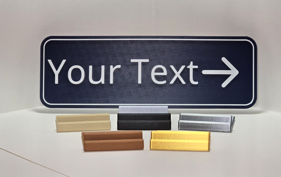 A tabletop sign stand holding a printed sign in a straight-on display view.